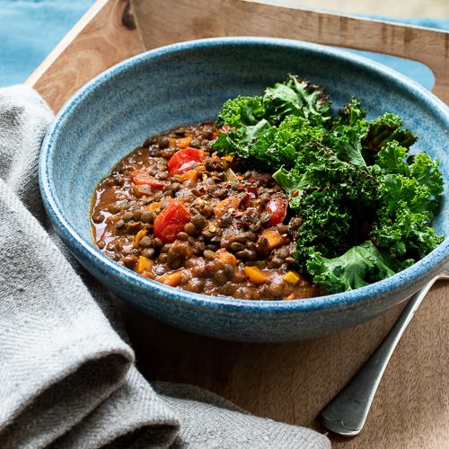 puy lentils spiced with tamarind, turmeric and chilli with crispy kale